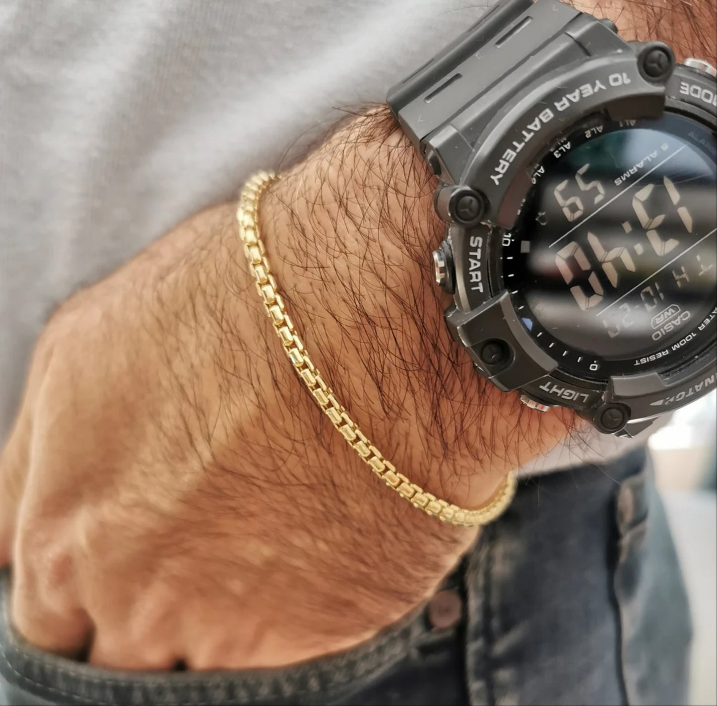 Valentino-Armband mit goldenen Gliedern für Herren