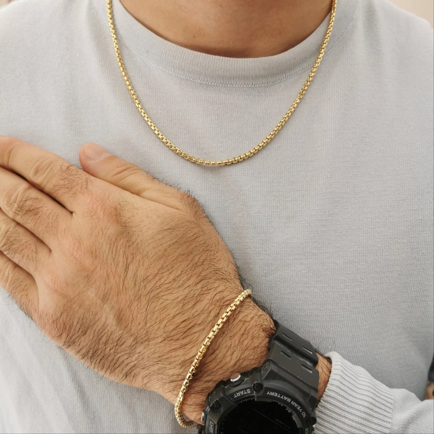 Valentino-Armband mit goldenen Gliedern für Herren