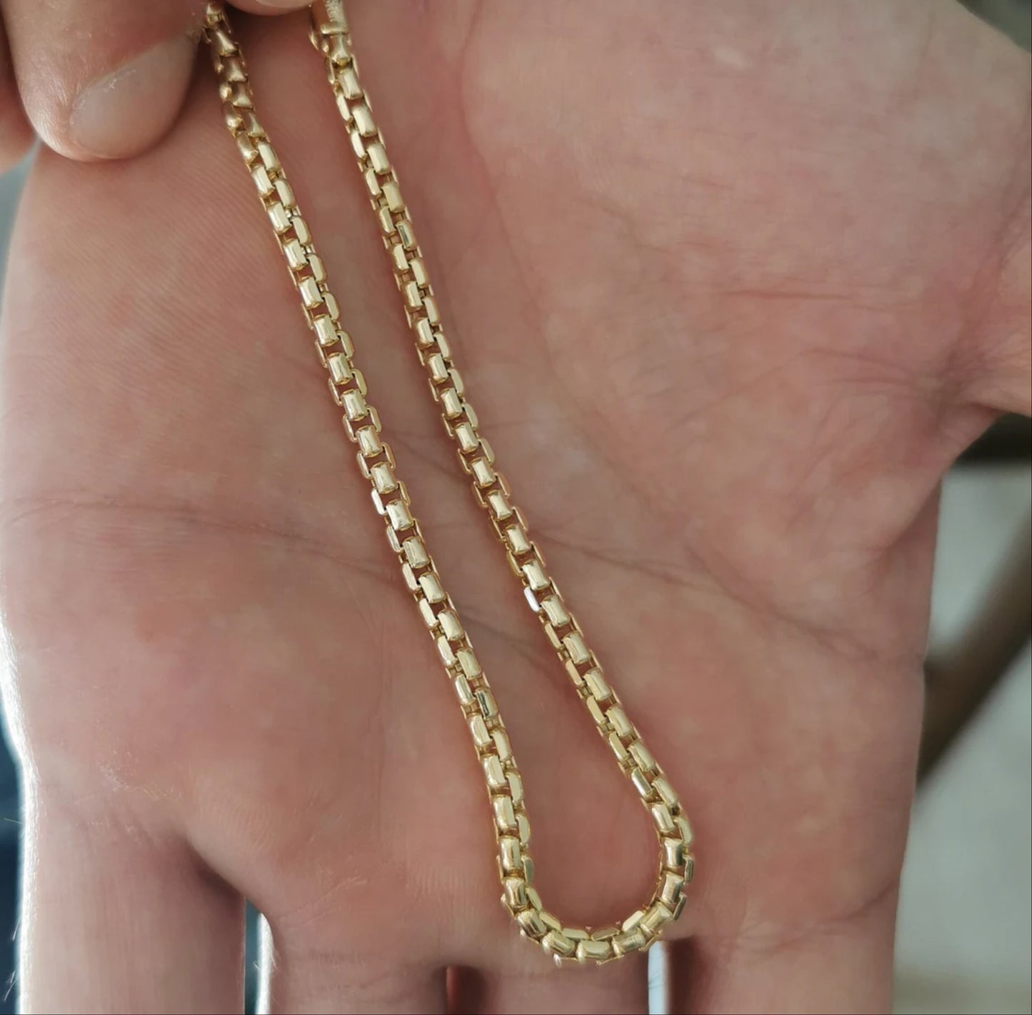 Valentino-Armband mit goldenen Gliedern für Herren